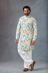 પેરેલલ પેન્ટ સાથે ટ્રોપિકલ ફ્લોરલ કોટન ફેસ્ટિવ કુર્તા